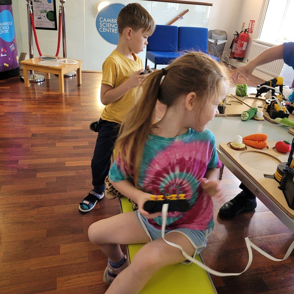 Children exploring hands-on exhibits at a science centre